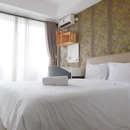 Modern Designed And Strategic Studio Room At Beverly Dago Apartment By Travelio